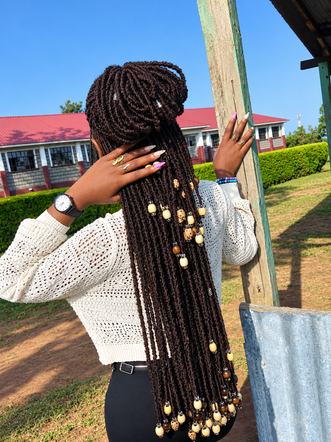 Sasha locks braided style accessorized with beads
